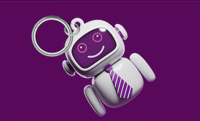 ARTY keyring on a purple background